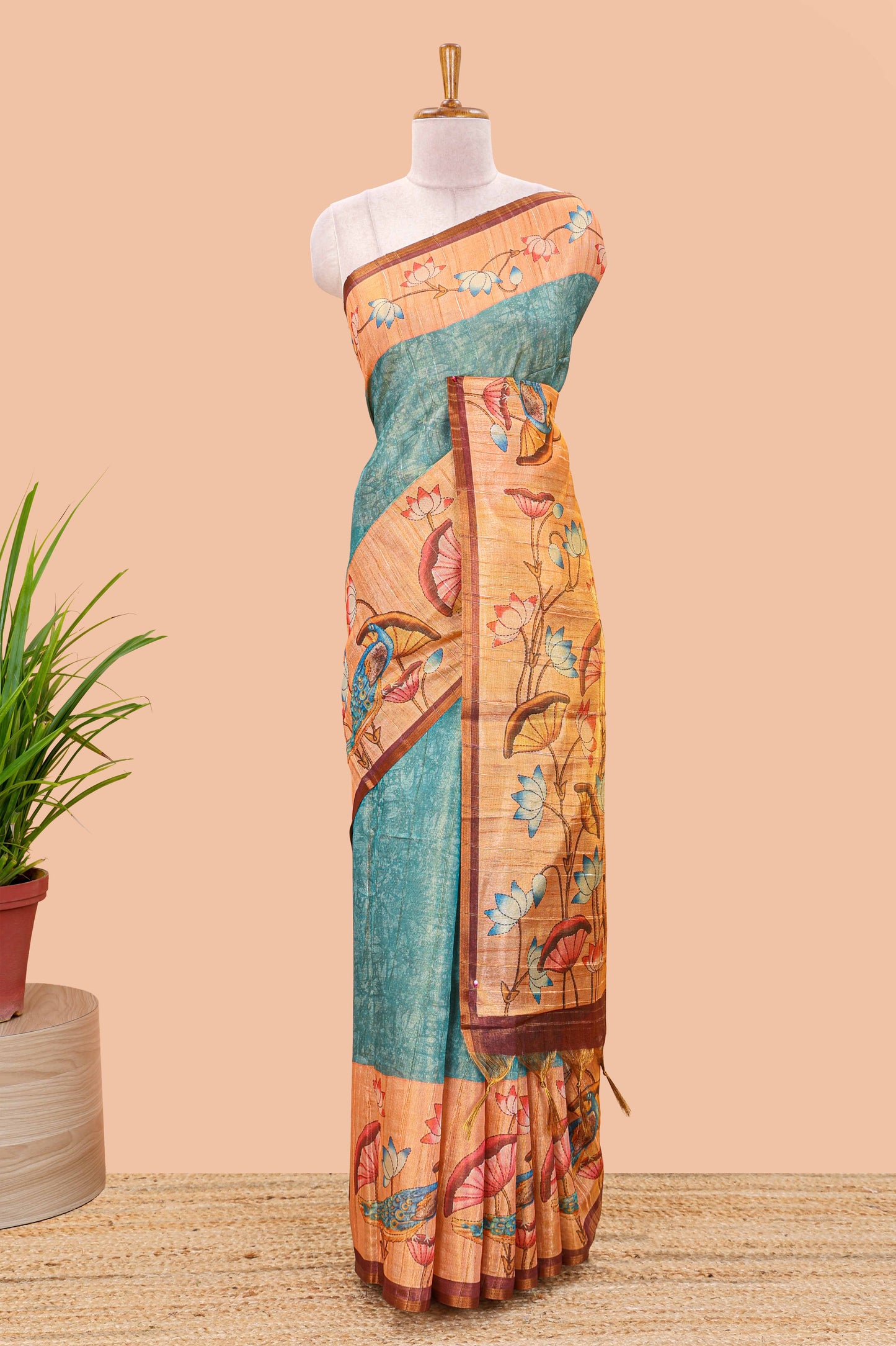 Peacock green tissue tussar saree with lotus jaal pallu and scattered lotus motif blouse