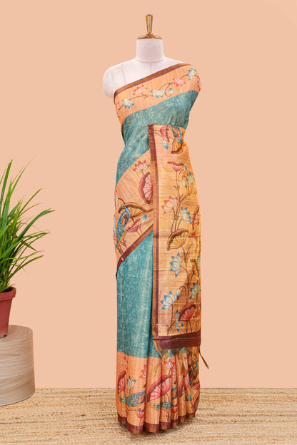 Peacock green tissue tussar saree with lotus jaal pallu and scattered lotus motif blouse