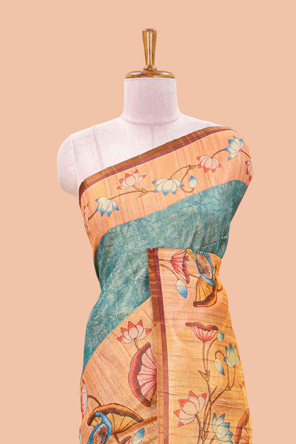 Peacock green tissue tussar saree with lotus jaal pallu and scattered lotus motif blouse