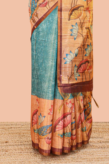 Peacock green tissue tussar saree with lotus jaal pallu and scattered lotus motif blouse