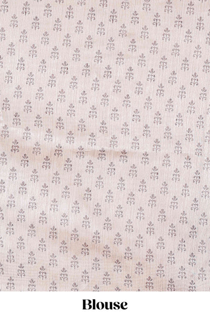 Blue chanderi cotton saree featuring ikkat style jaal print and contrast floral border and pallu