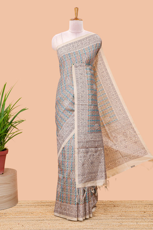 Multi color chanderi cotton saree featuring geometric jaal design and floral vine border