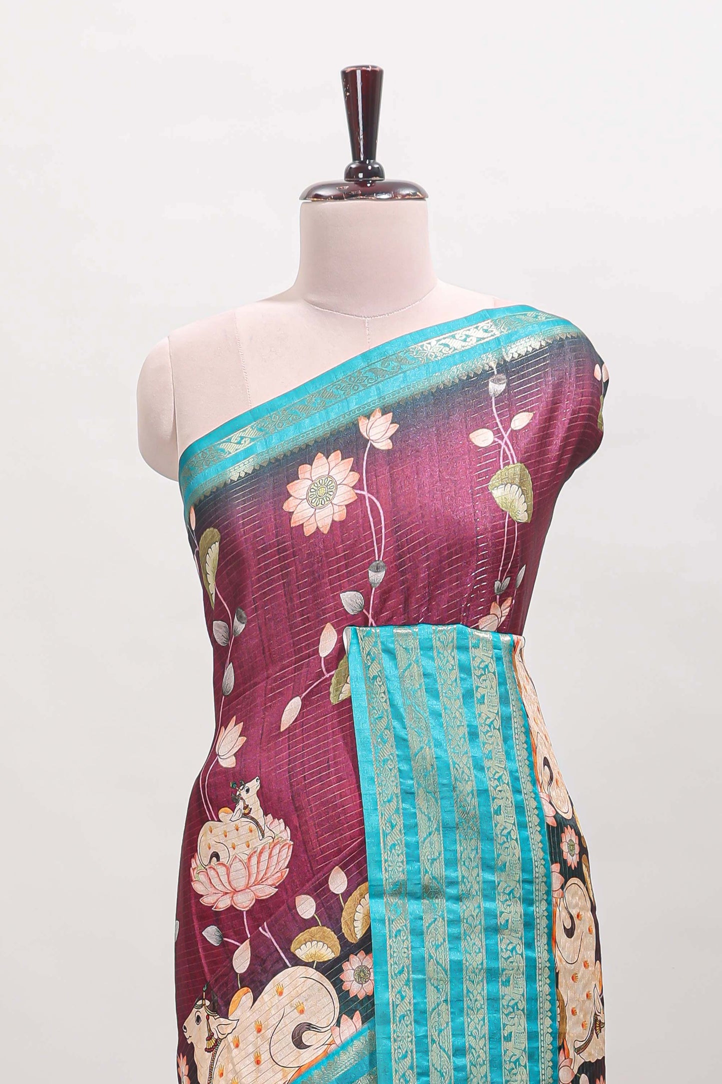 Magenta striped pichwai motifs dola silk saree with contrast zari border and blouse