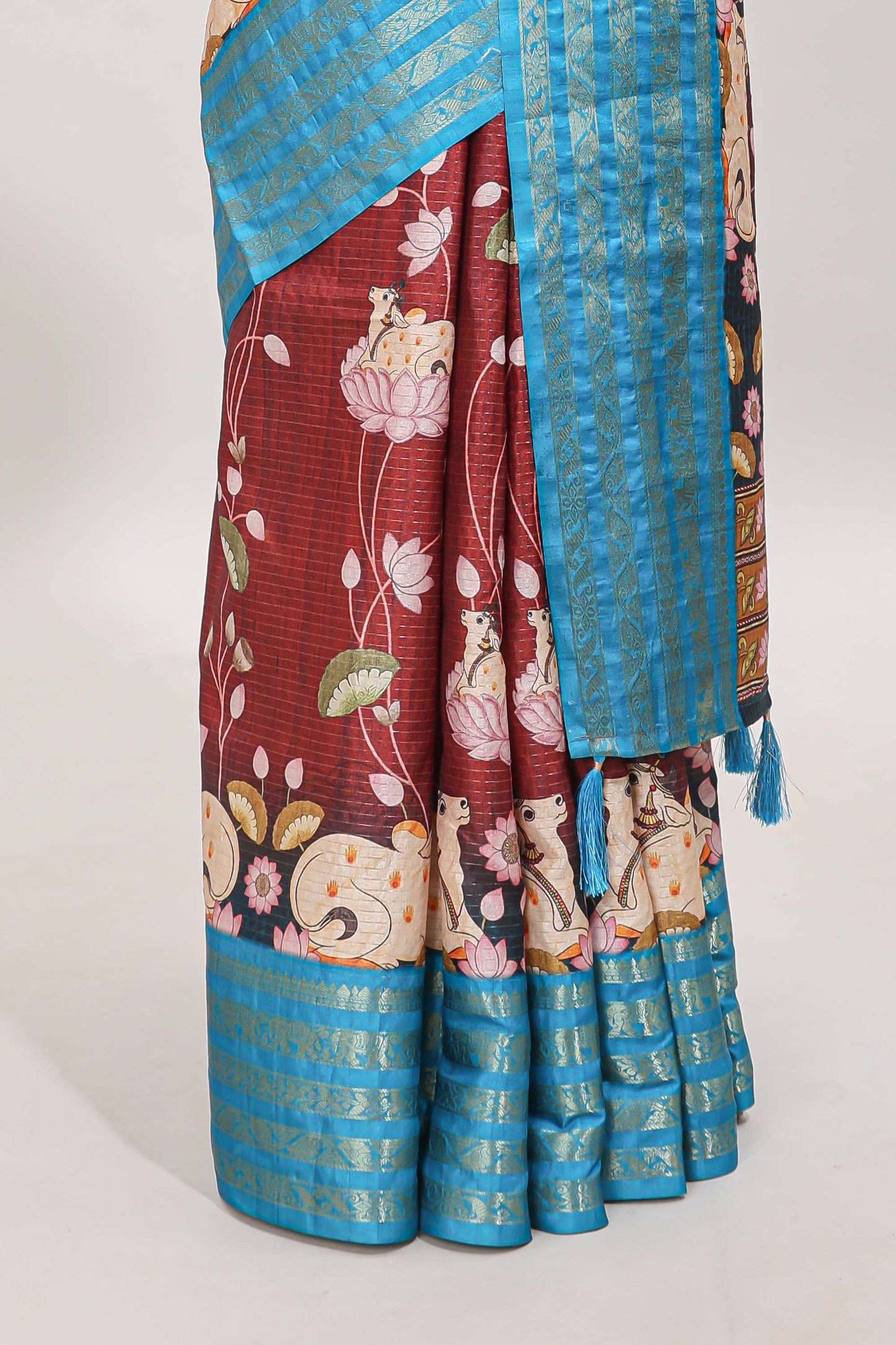 Brick red striped pichwai motifs dola silk saree with contrast zari border and blouse
