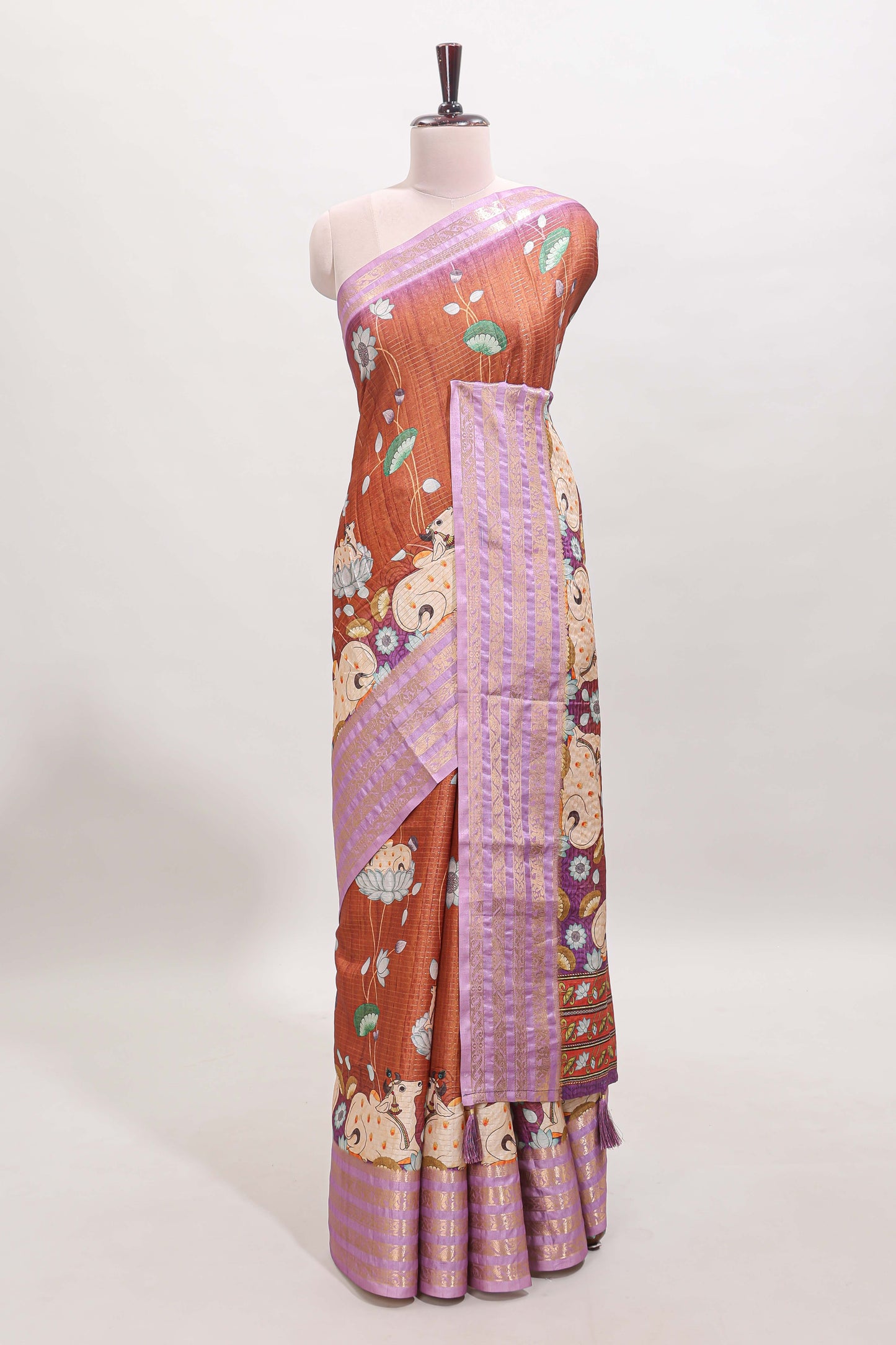 Orange striped pichwai motifs dola silk saree with contrast zari border and blouse