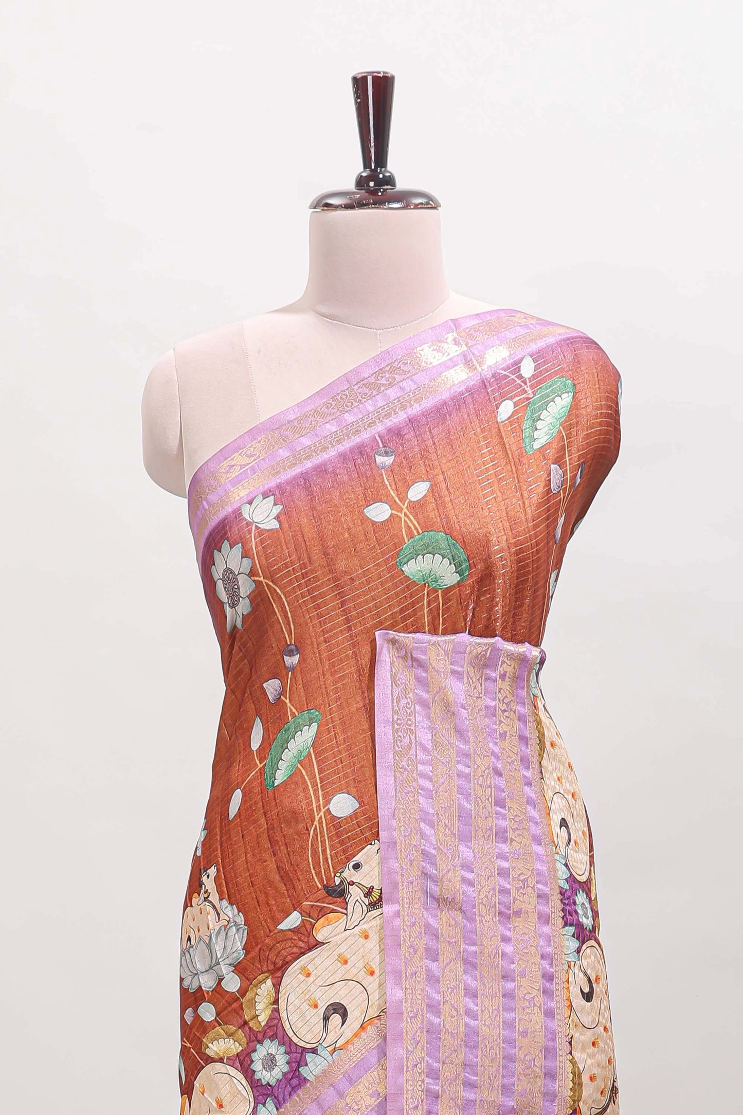 Orange striped pichwai motifs dola silk saree with contrast zari border and blouse