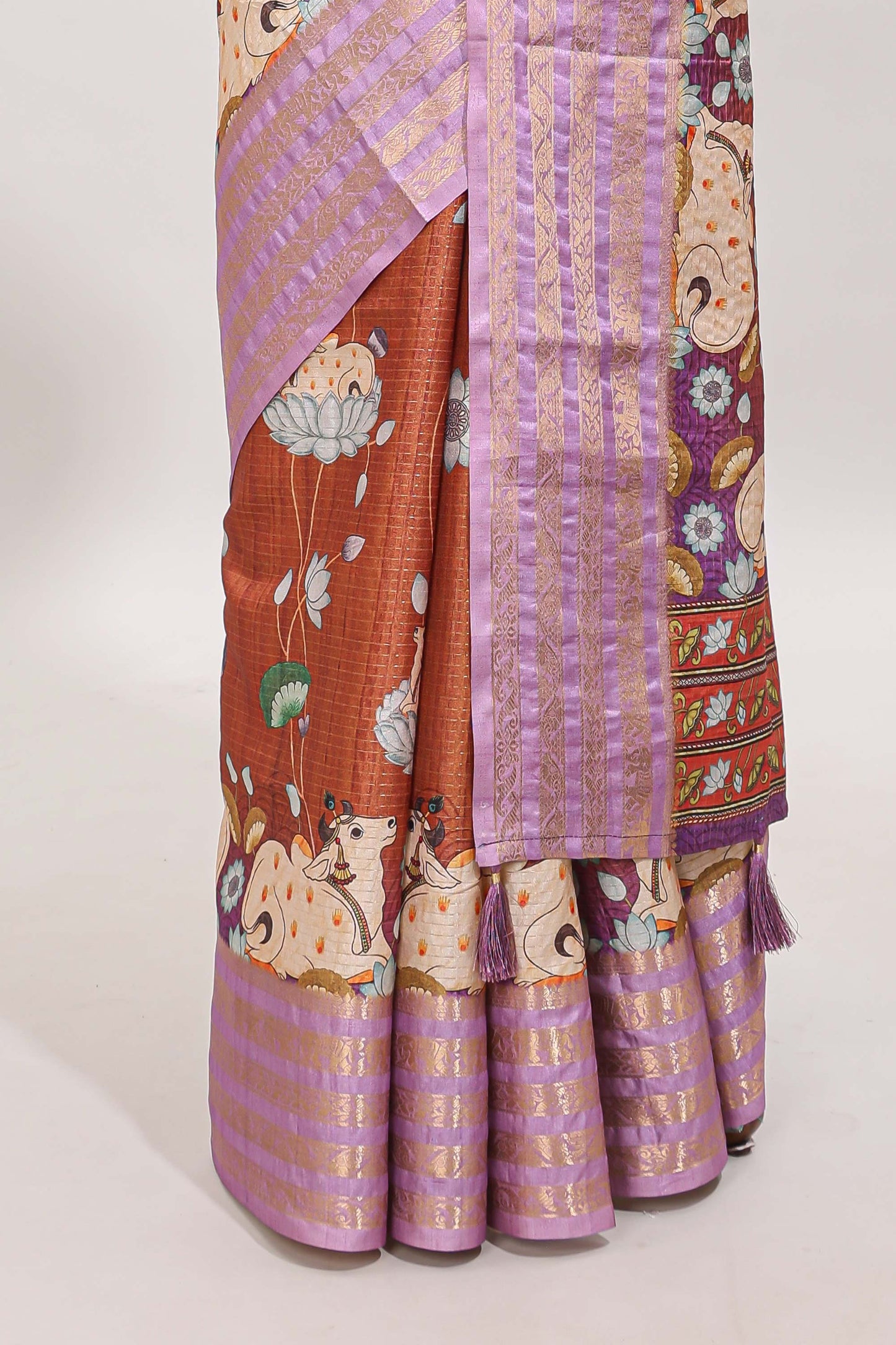 Orange striped pichwai motifs dola silk saree with contrast zari border and blouse