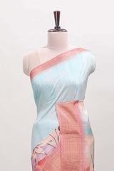 Blue checked floral design dola silk saree with contrast zari border and matching blouse