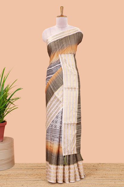 Olive green dola silk saree featuring geometric block print and contrast zari border