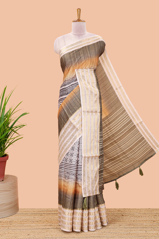 Olive green dola silk saree featuring geometric block print and contrast zari border