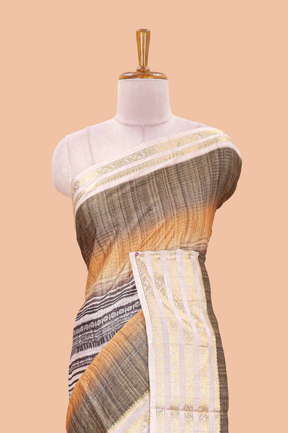 Olive green dola silk saree featuring geometric block print and contrast zari border