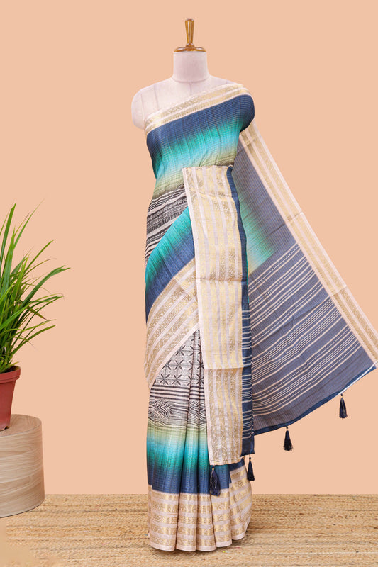 Blue dola silk saree featuring geometric block print and contrast zari border