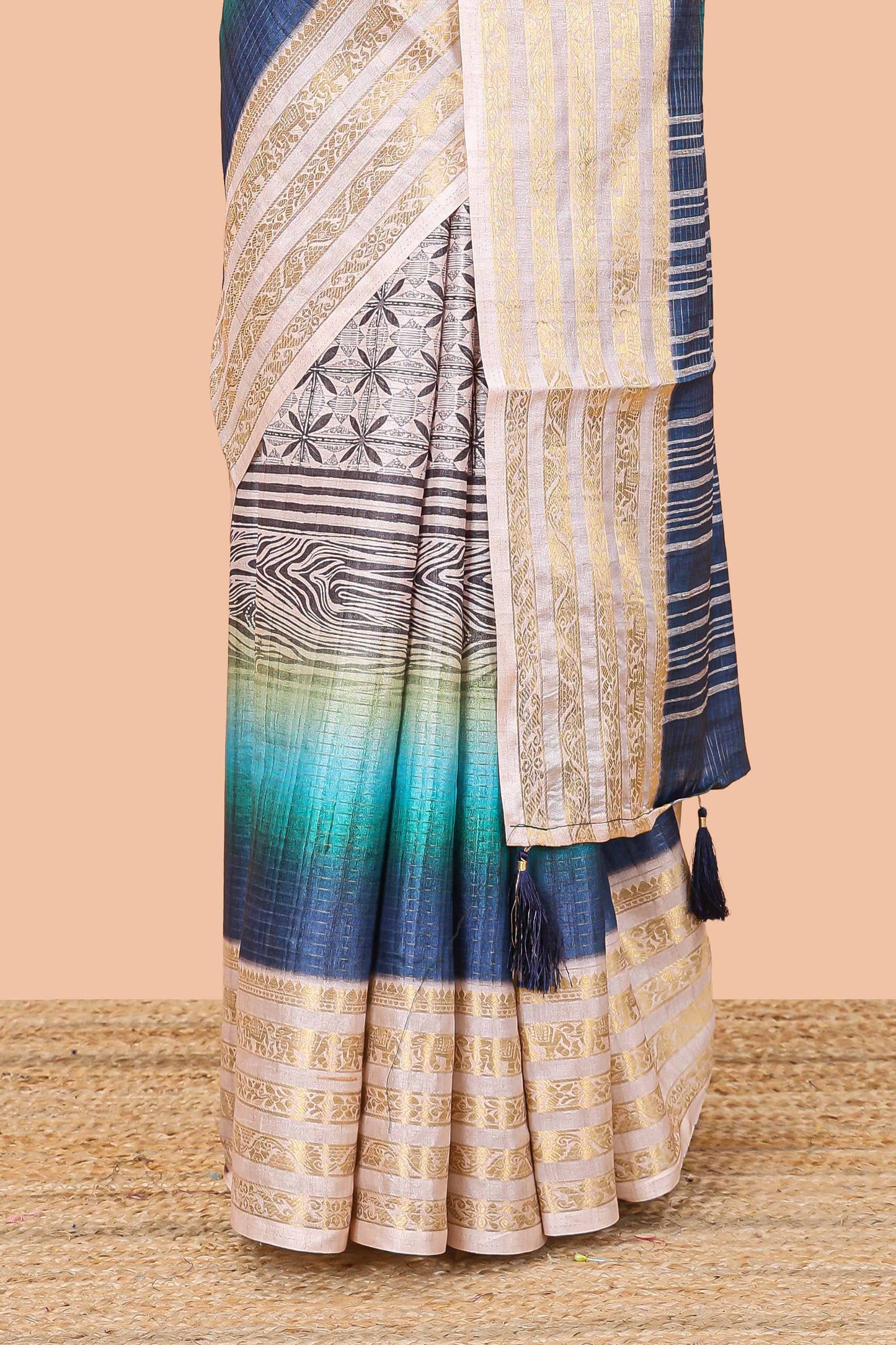 Blue dola silk saree featuring geometric block print and contrast zari border