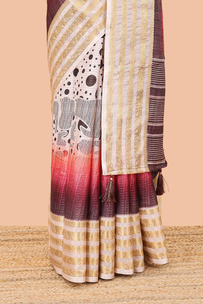 Maroon dola silk saree featuring dot striped design and contrast zari border