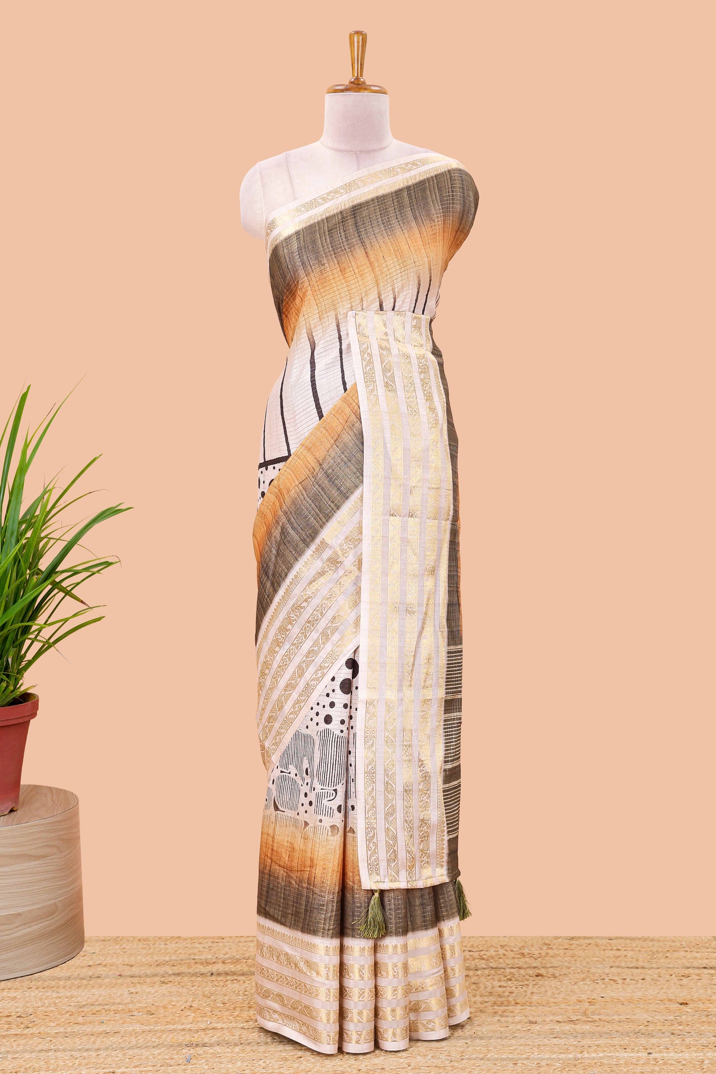 Olive green dola silk saree featuring dot striped design and contrast zari border