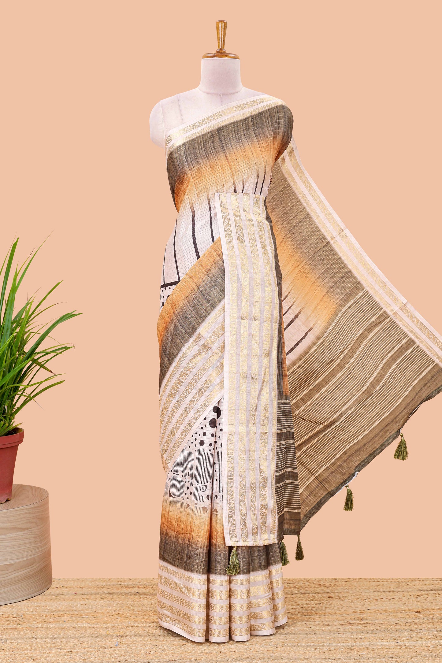 Olive green dola silk saree featuring dot striped design and contrast zari border