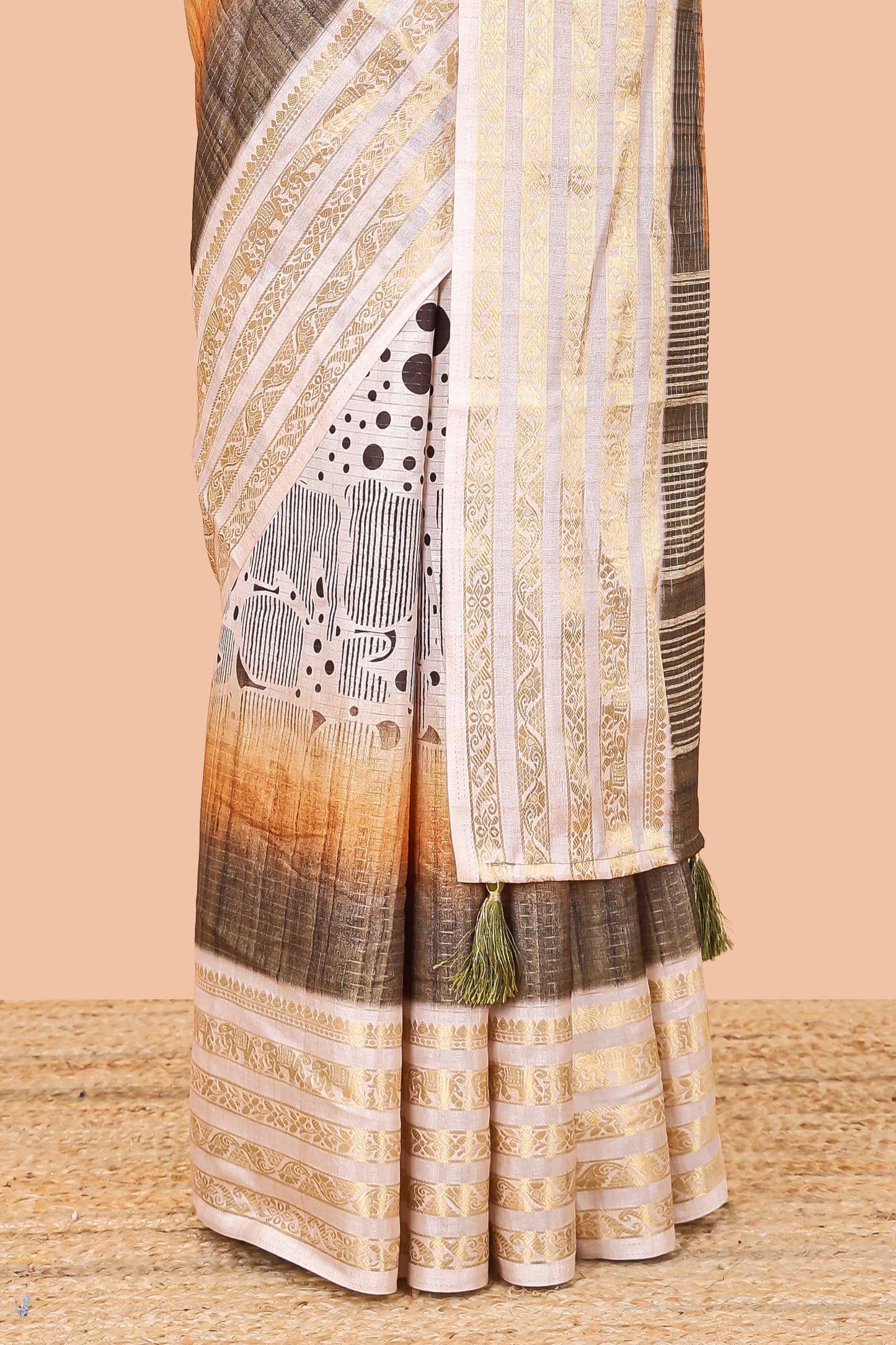 Olive green dola silk saree featuring dot striped design and contrast zari border