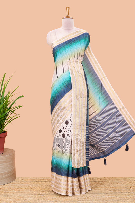 Blue dola silk saree featuring dot striped design and contrast zari border