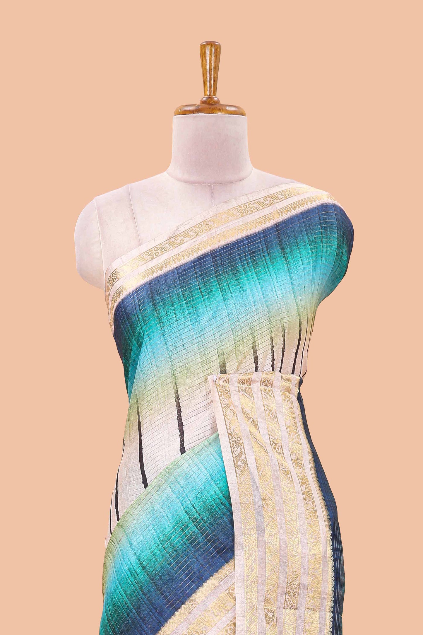 Blue dola silk saree featuring dot striped design and contrast zari border