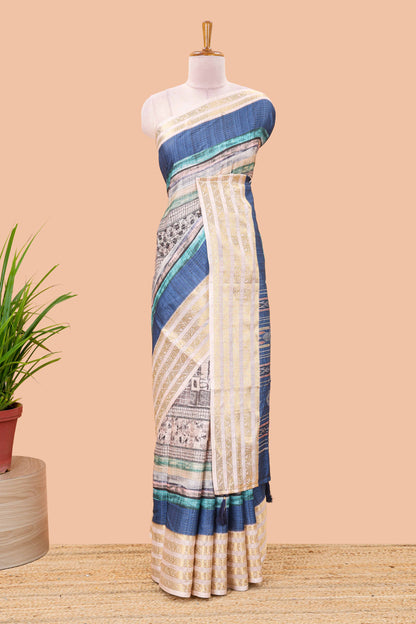 Blue dola silk saree featuring monochrome fusion print and contrast zari border