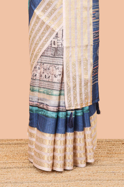 Blue dola silk saree featuring monochrome fusion print and contrast zari border