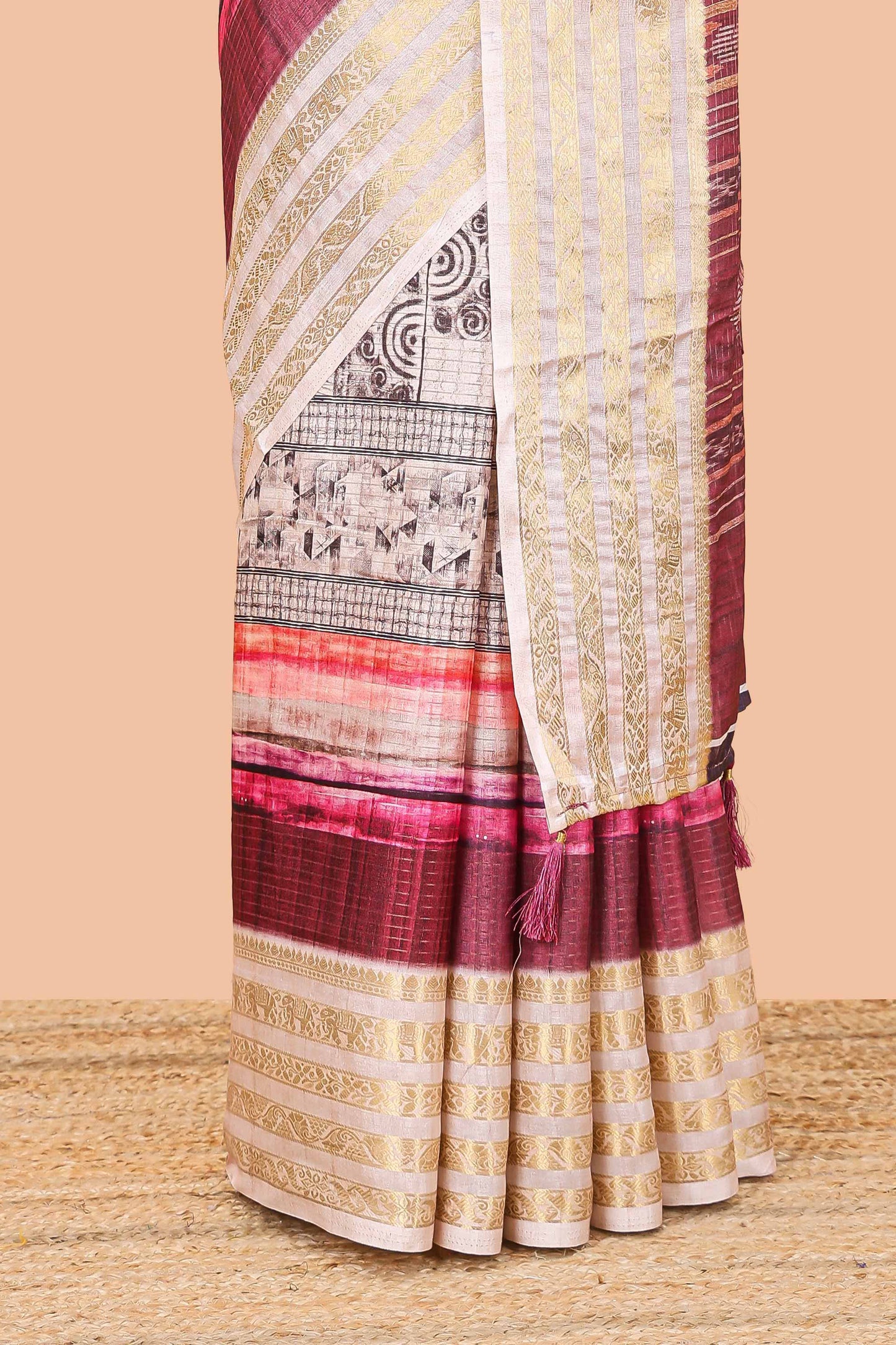 Maroon dola silk saree featuring monochrome fusion print and contrast zari border