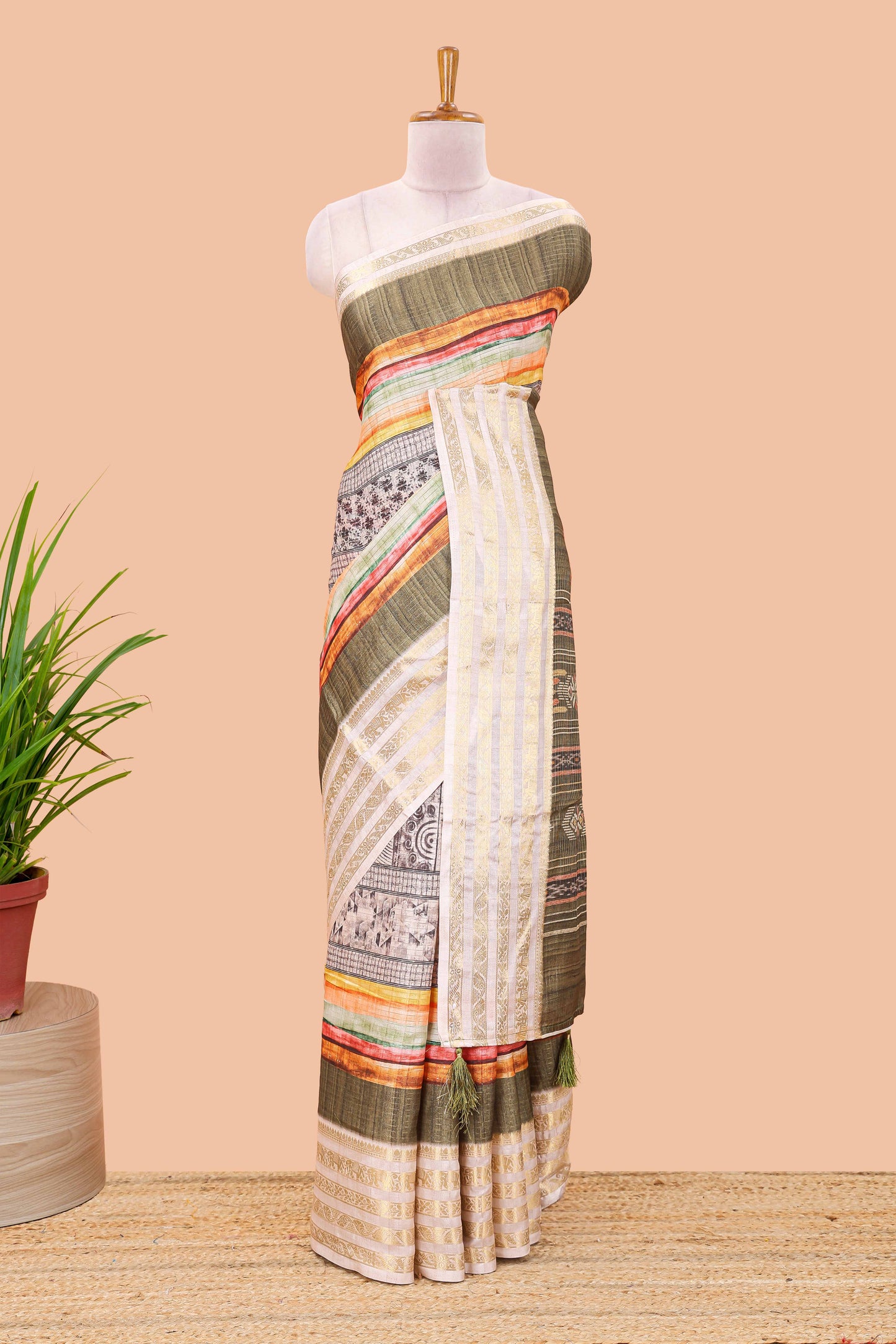 Green dola silk saree featuring monochrome fusion print and contrast zari border