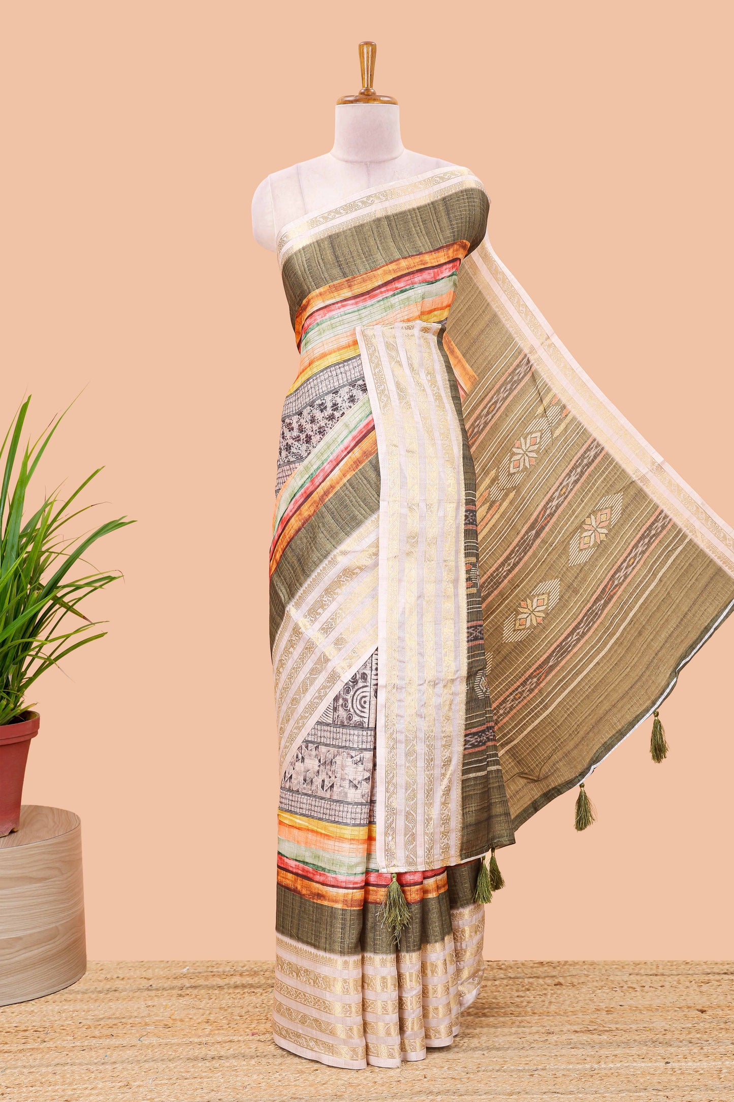 Green dola silk saree featuring monochrome fusion print and contrast zari border