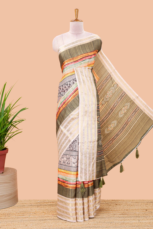 Green dola silk saree featuring monochrome fusion print and contrast zari border