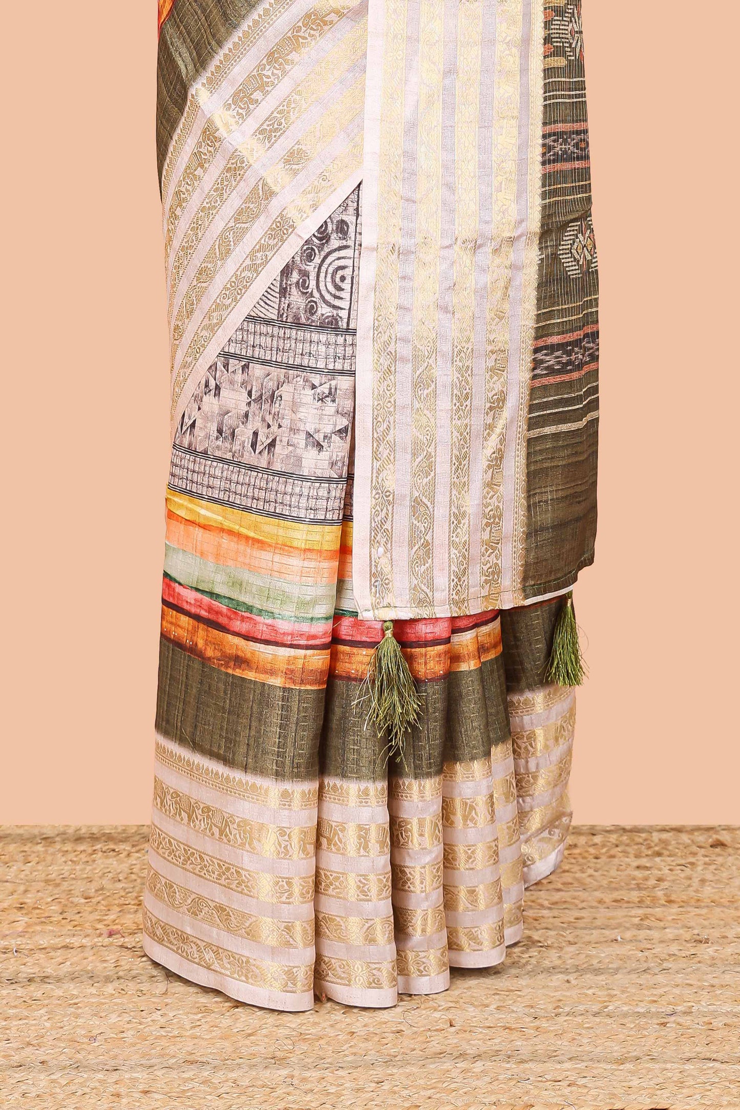 Green dola silk saree featuring monochrome fusion print and contrast zari border