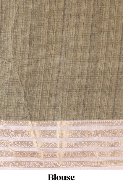 Green dola silk saree featuring monochrome fusion print and contrast zari border