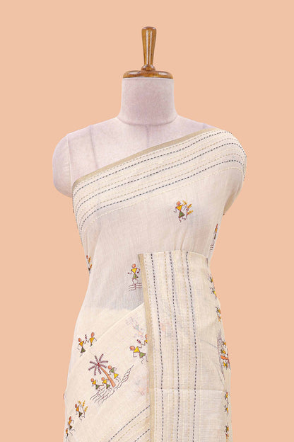 Cream chanderi cotton saree with warli art embroidered body and vertical stitched pallu