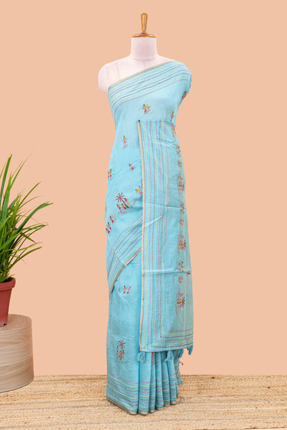 Blue chanderi cotton saree with warli art embroidered body and vertical stitched pallu