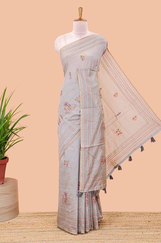 Grey chanderi cotton saree with warli art embroidered body and vertical stitched pallu