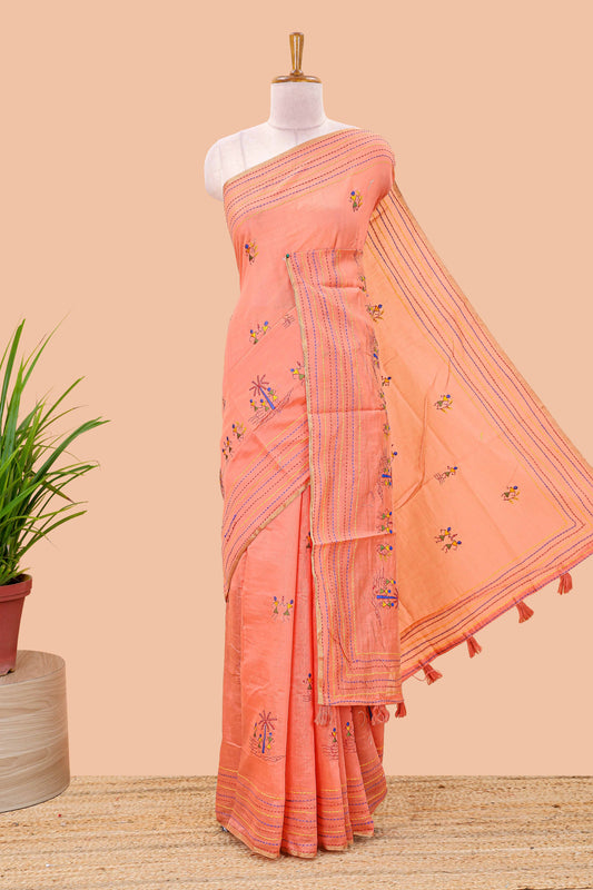 Orange chanderi cotton saree with warli art embroidered body and vertical stitched pallu