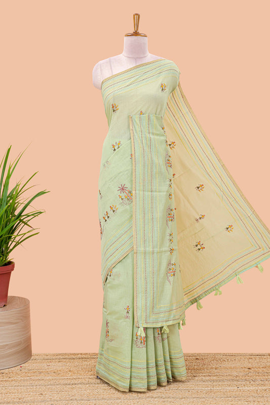 Green chanderi cotton saree with warli art embroidered body and vertical stitched pallu