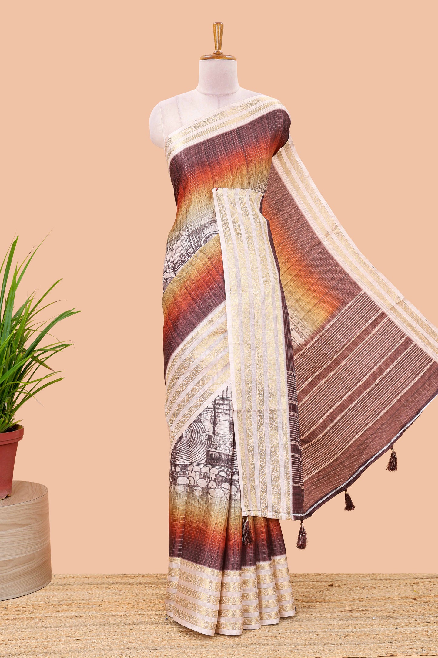 Brown dola silk saree with temple architecture print, zari striped pallu and border