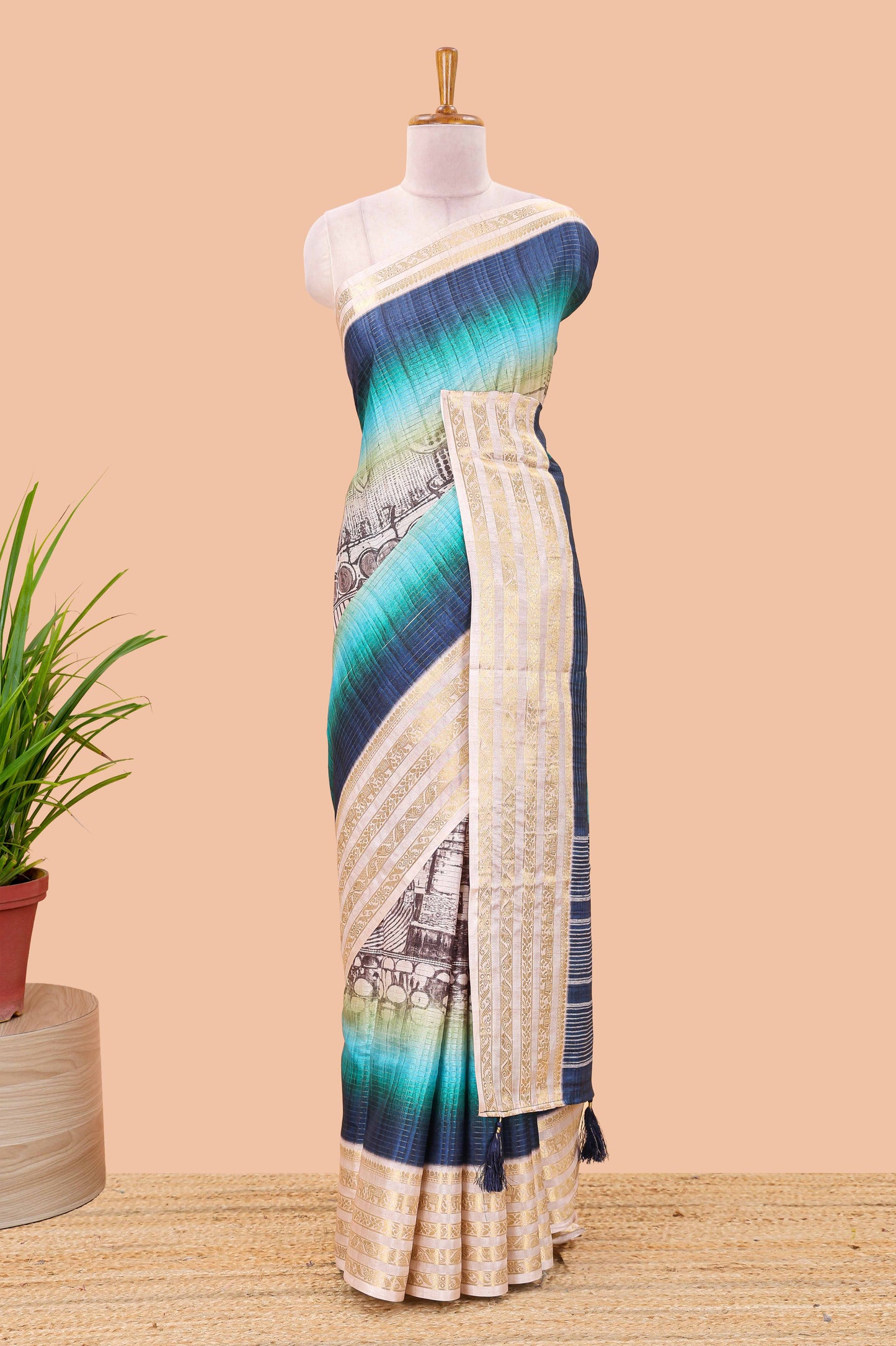 Blue dola silk saree with temple architecture print, zari striped pallu and border