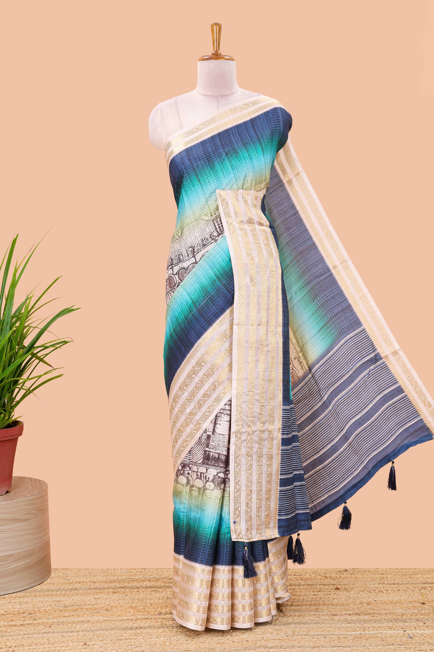Blue dola silk saree with temple architecture print, zari striped pallu and border