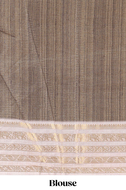 Green dola silk saree with temple architecture print, zari striped pallu and border