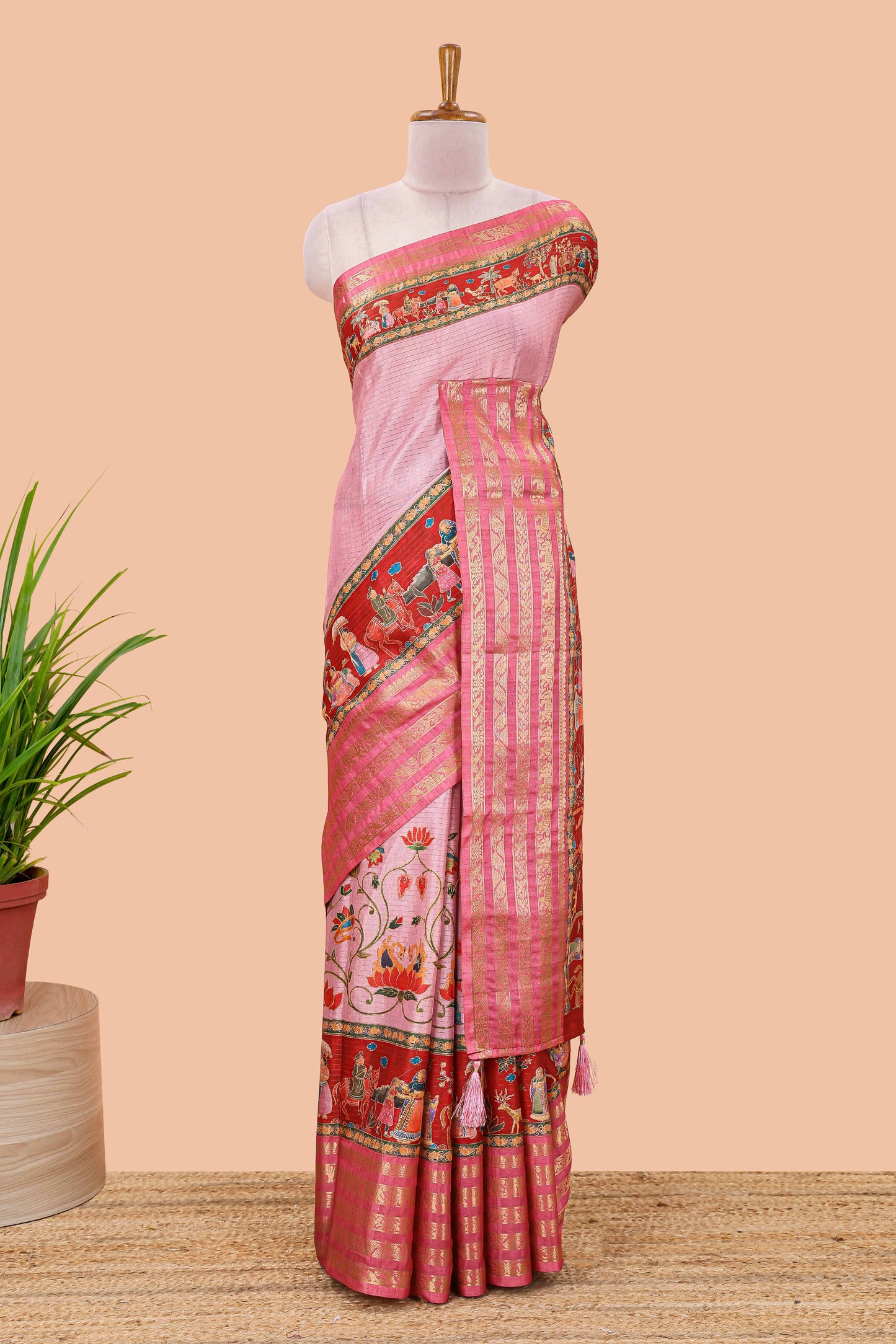 Pink dola silk saree with lotus bird creeper print and village themed pallu