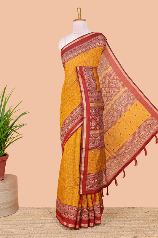 Mustard chanderi cotton geometric diamond mirror work saree with contrast zari border