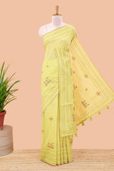 Green chanderi cotton saree with all over warli style tribal couple embroidery and hand stitched line work