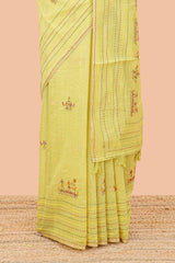 Green chanderi cotton saree with all over warli style tribal couple embroidery and hand stitched line work