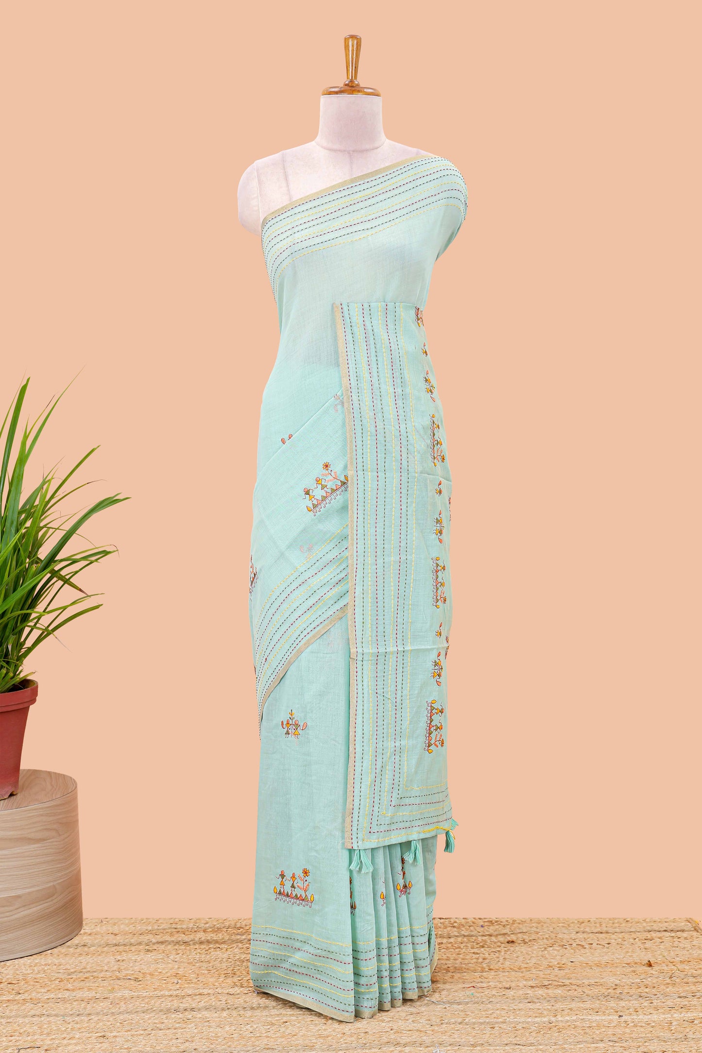 Blue chanderi cotton saree with all over warli style tribal couple embroidery and hand stitched line work