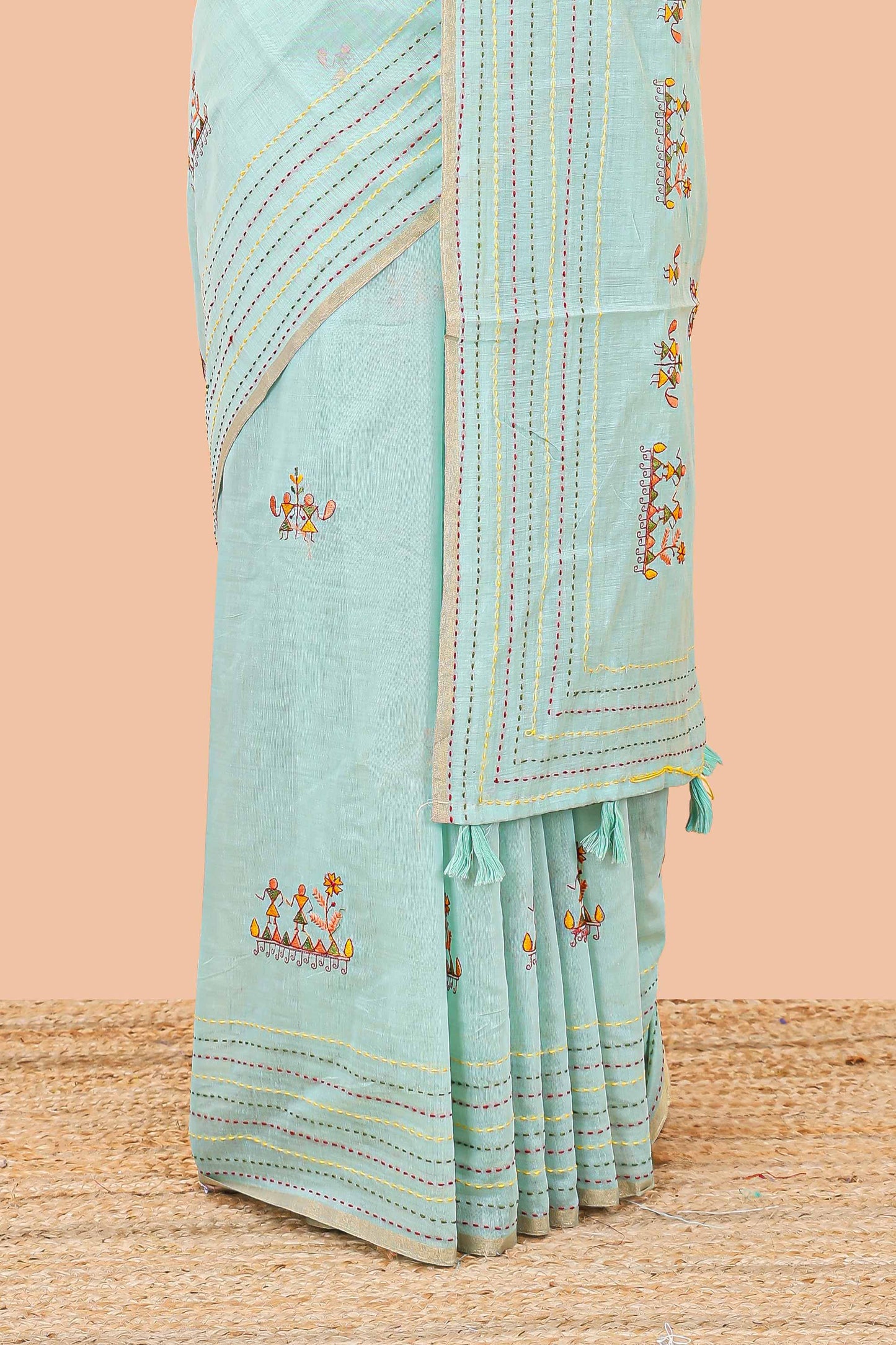 Blue chanderi cotton saree with all over warli style tribal couple embroidery and hand stitched line work