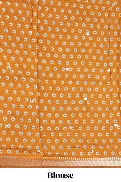 Cream chanderi cotton saree with geometric floral butta, mustard zari border and patola inspired mirror work