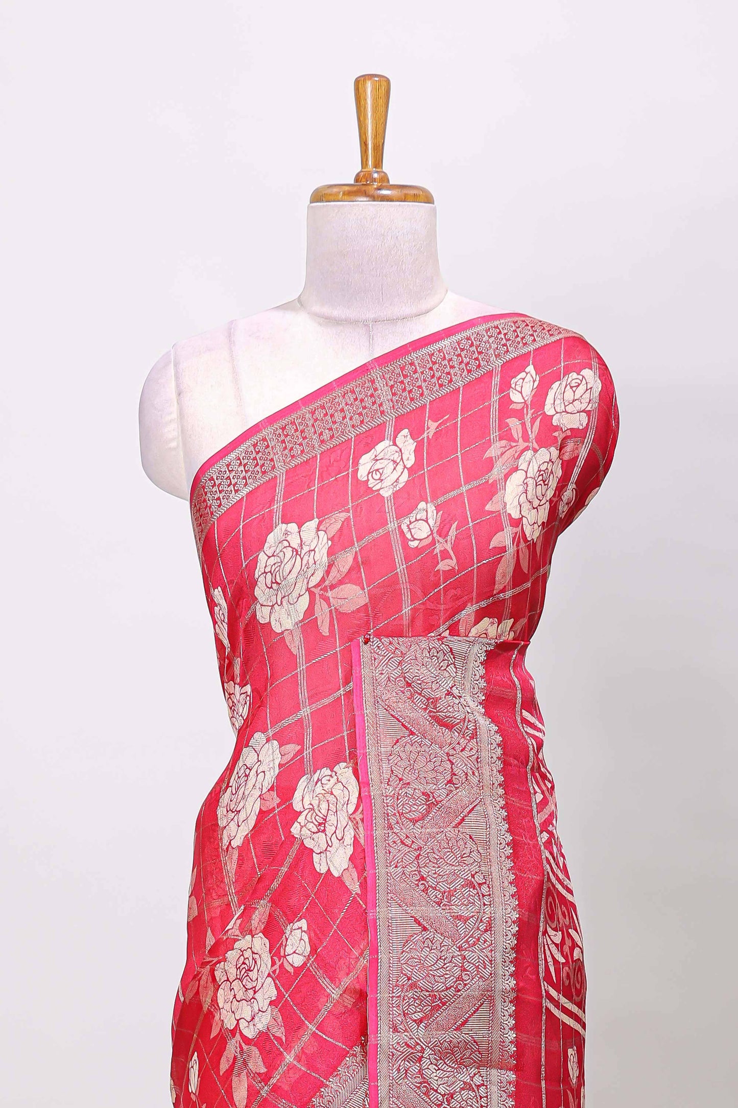 Pink checks marsh mellow gulab floral print saree with gold zari border and blouse