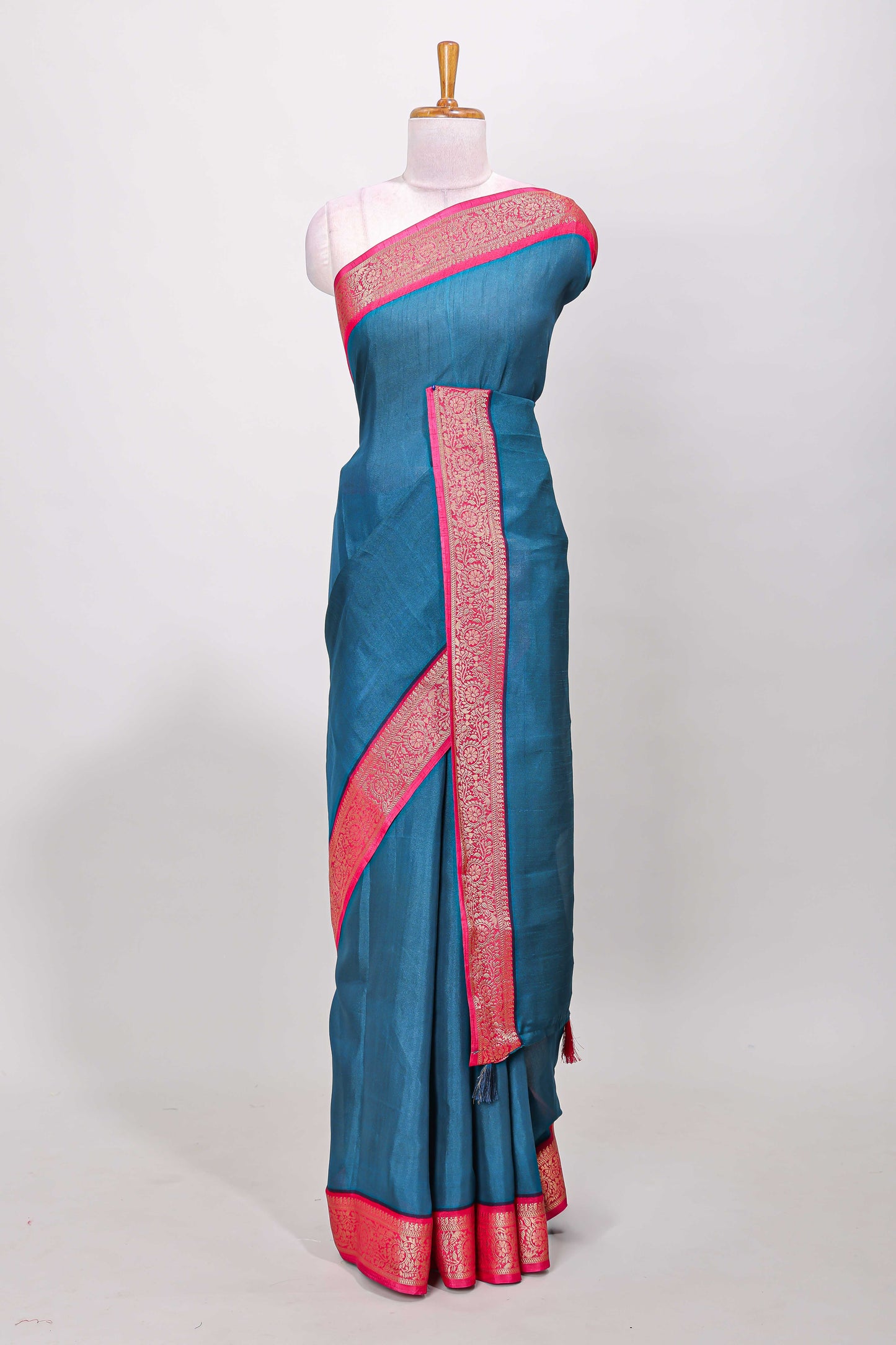 Blue marsh mellow plain saree with contrast gold zari border and butta blouse
