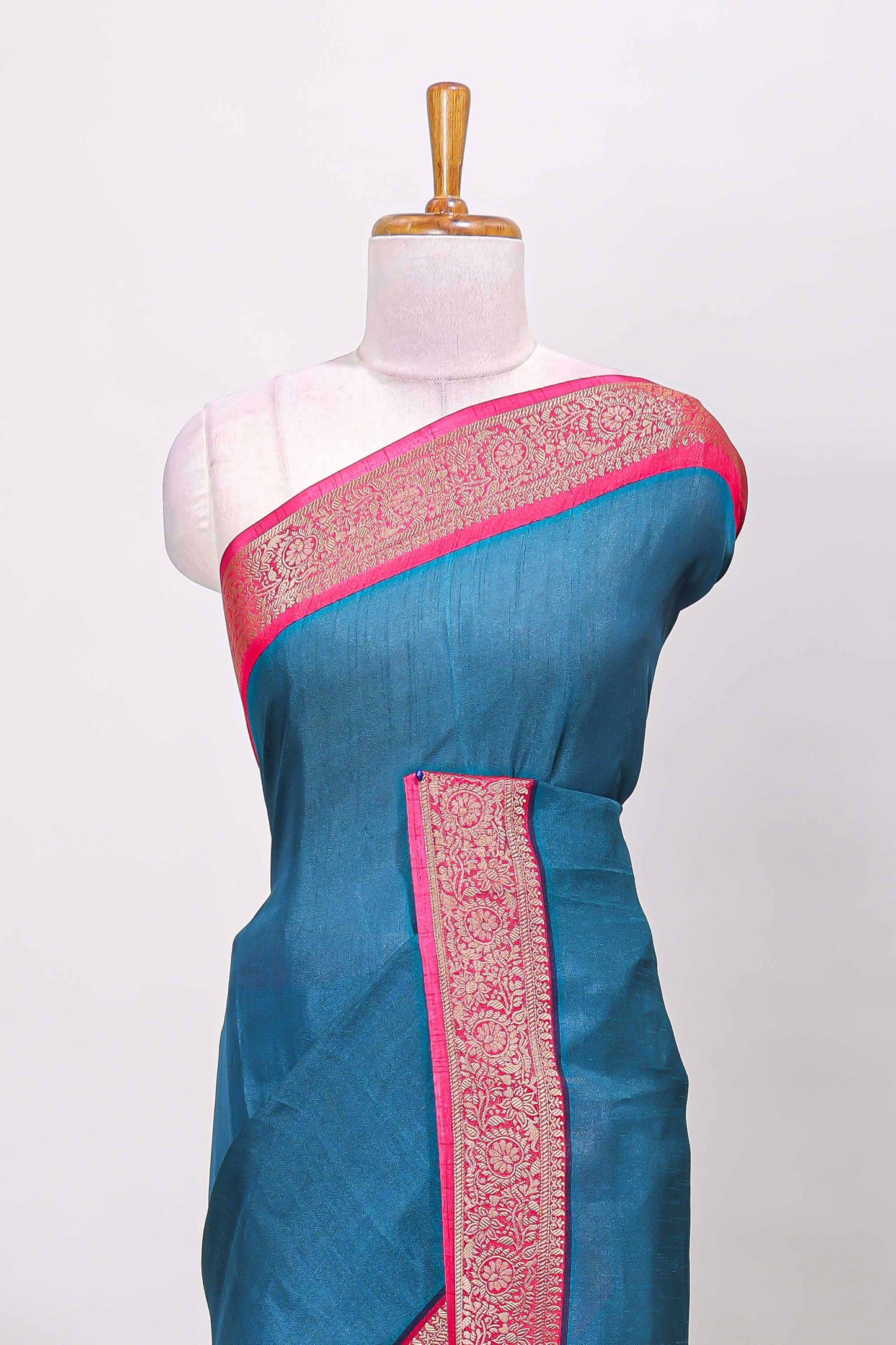 Blue marsh mellow plain saree with contrast gold zari border and butta blouse